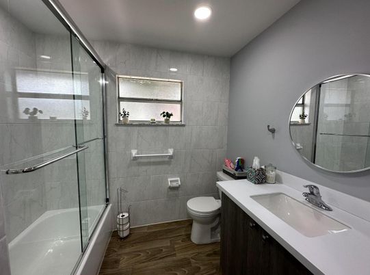 Bathroom, Glass Shower, Interior, Marble Walls, Recessed Lighting, Wood Texture Flooring