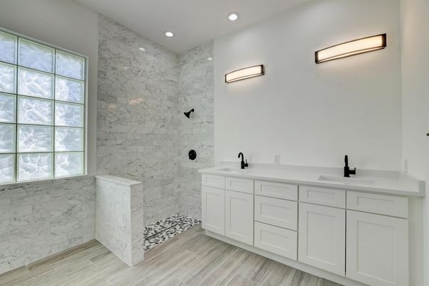 Bathroom, Dual Sink Vanities, Interior, Marble Walls, Recessed Lighting, Wood Texture Flooring