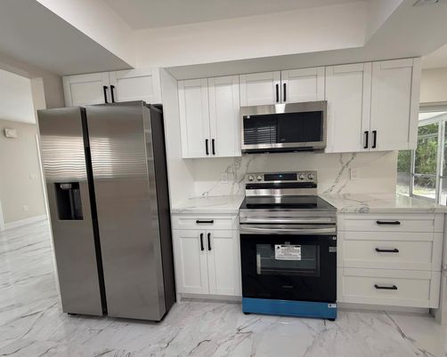 Interior, Kitchen, Marble, Marble Walls, Stainless Steel Appliances