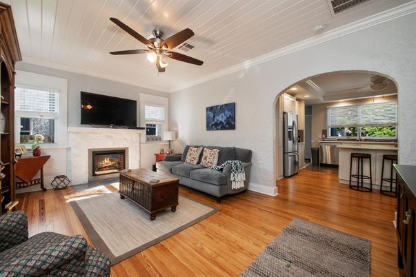 Fireplace, Interior, Kitchen, Living room, Recessed Lighting, Stainless Steel Appliances, Wood Texture Flooring