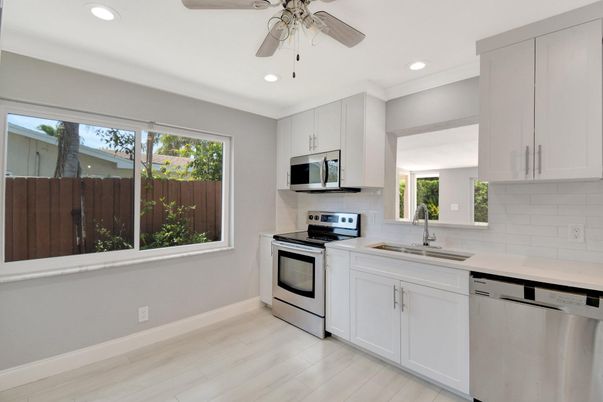 Interior, Kitchen, Recessed Lighting, Stainless Steel Appliances, Wood Texture Flooring