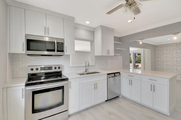 Interior, Kitchen, Recessed Lighting, Stainless Steel Appliances, Wood Texture Flooring