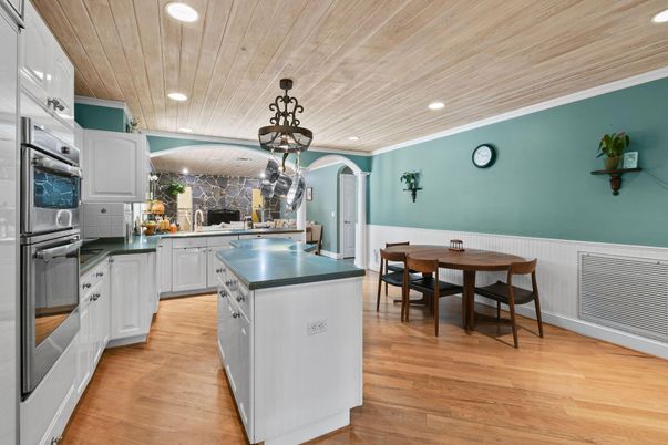 Dining room, Interior, Kitchen, Pendant Lights, Recessed Lighting, Stainless Steel Appliances, Wooden Ceilings, Wood Texture Flooring