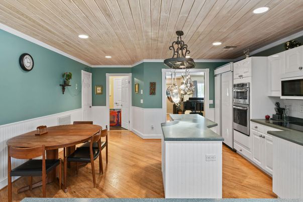 Dining room, Interior, Kitchen, Pendant Lights, Recessed Lighting, Stainless Steel Appliances, Wooden Ceilings, Wood Texture Flooring
