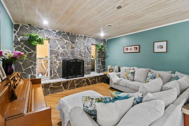 Fireplace, Interior, Living room, Recessed Lighting, Stone Walls, Wood Texture Flooring