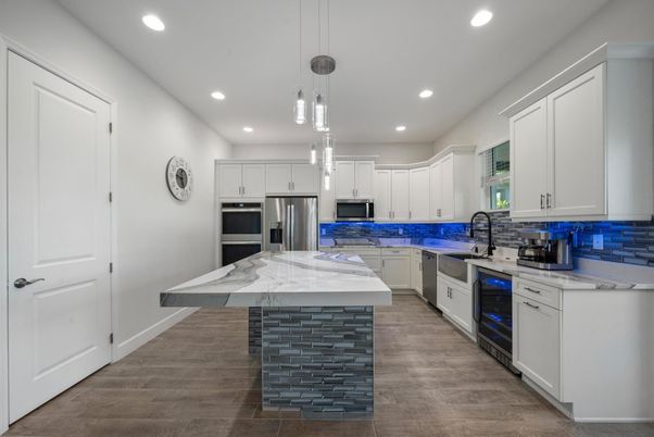 Interior, Kitchen, Pendant Lights, Recessed Lighting, Stainless Steel Appliances, Wood Texture Flooring
