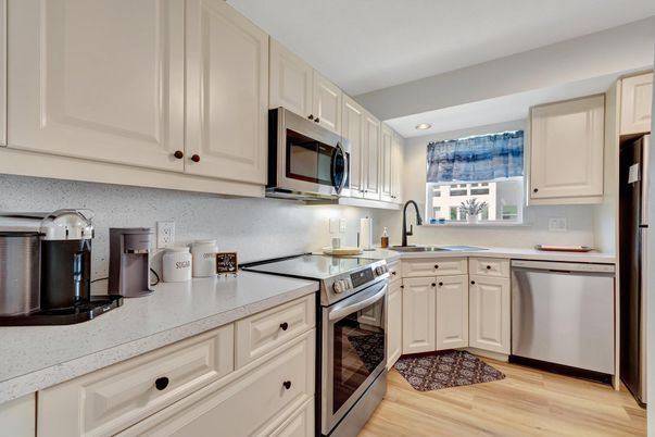 Interior, Kitchen, Recessed Lighting, Stainless Steel Appliances, Wood Texture Flooring