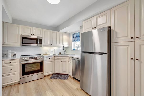 Interior, Kitchen, Recessed Lighting, Stainless Steel Appliances, Wood Texture Flooring