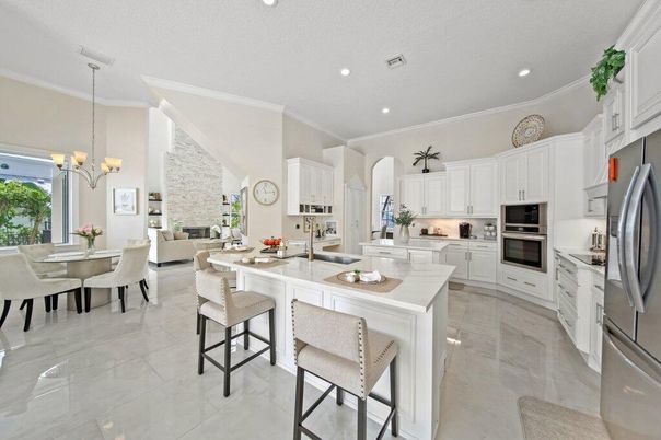Chandelier, Dining room, Interior, Kitchen, Living room, Pendant Lights, Recessed Lighting, Stainless Steel Appliances