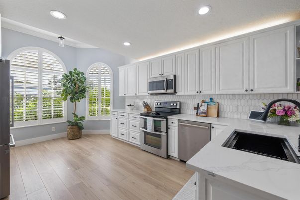 Interior, Kitchen, Recessed Lighting, Stainless Steel Appliances, Wood Texture Flooring