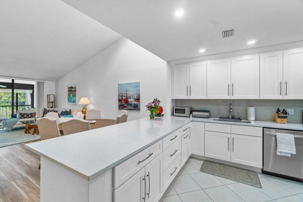 Dining room, Interior, Kitchen, Living room, Recessed Lighting, Stainless Steel Appliances, Wood Texture Flooring