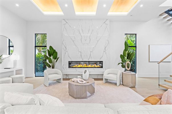 Fireplace, Interior, Living room, Marble Walls, Recessed Lighting, Wood Texture Flooring
