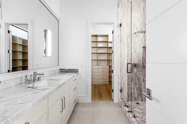 Bathroom, Dual Sink Vanities, Glass Shower, Interior, Walk-in Closets, Wood Texture Flooring