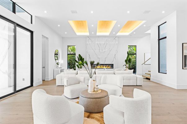 Fireplace, Interior, Living room, Marble Walls, Recessed Lighting, Wood Texture Flooring