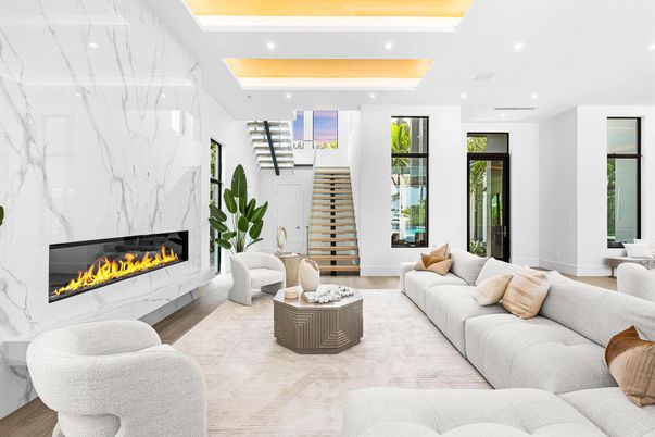 Fireplace, Interior, Living room, Marble Walls, Recessed Lighting, Wood Texture Flooring