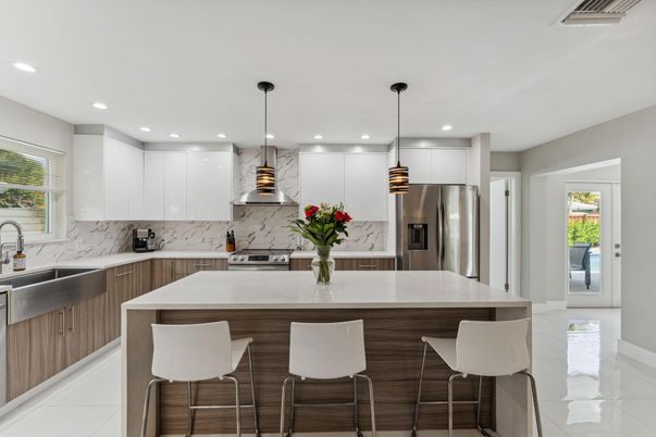 Interior, Kitchen, Marble Walls, Pendant Lights, Recessed Lighting, Stainless Steel Appliances