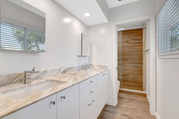 Bathroom, Dual Sink Vanities, Interior, Recessed Lighting, Wood Texture Flooring, Wooden Walls