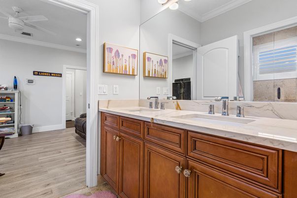 Bathroom, Dual Sink Vanities, Interior, Recessed Lighting, Wood Texture Flooring