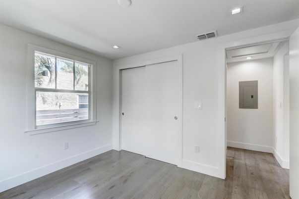 Elevator, Empty room, Interior, Recessed Lighting, Wood Texture Flooring