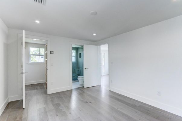 Bathroom, Empty room, Glass Shower, Interior, Recessed Lighting, Wood Texture Flooring