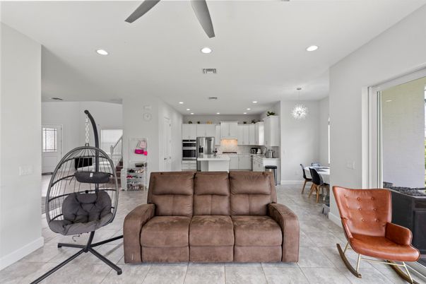 Chandelier, Dining room, Interior, Kitchen, Living room, Recessed Lighting, Stainless Steel Appliances