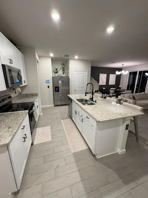 Chandelier, Interior, Kitchen, Recessed Lighting, Stainless Steel Appliances, Wood Texture Flooring