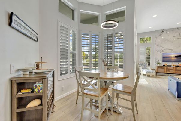 Dining room, Fireplace, Interior, Marble Walls, Pendant Lights, Recessed Lighting, Wood Texture Flooring