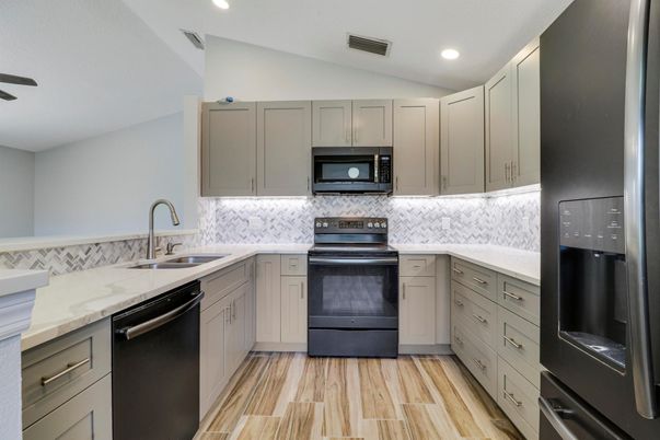 Interior, Kitchen, Recessed Lighting, Stainless Steel Appliances, Wood Texture Flooring