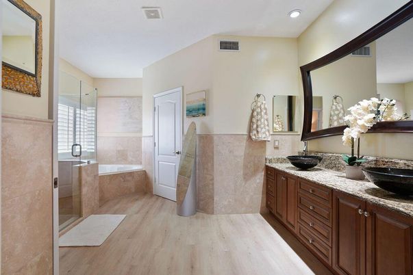 Bathroom, Dual Sink Vanities, Glass Shower, Interior, Recessed Lighting, Wood Texture Flooring