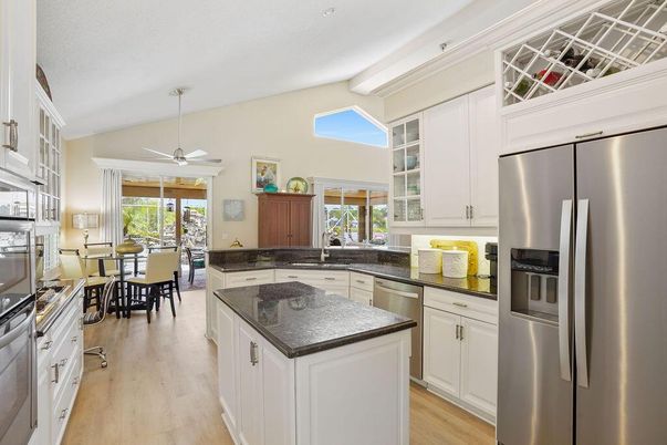 Dining room, Interior, Kitchen, Recessed Lighting, Stainless Steel Appliances, Wood Texture Flooring