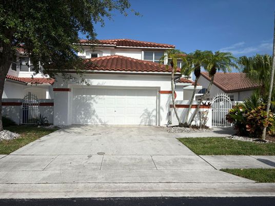 Attached, Exterior, Facade, Spanish Mediterranean