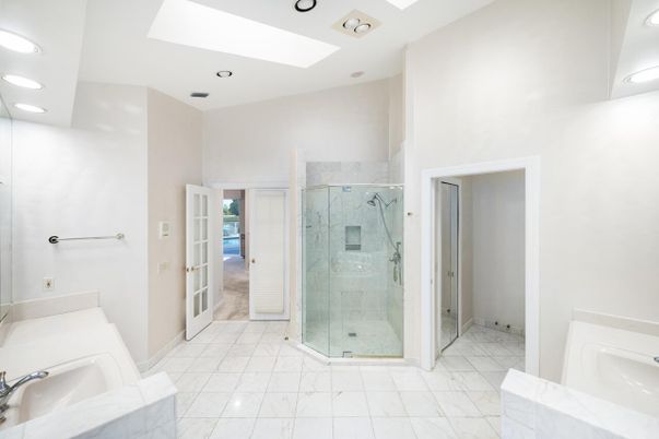 Bathroom, Dual Sink Vanities, Glass Shower, Interior, Marble, Marble Walls, Recessed Lighting