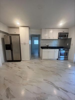 Interior, Kitchen, Marble, Recessed Lighting, Stainless Steel Appliances