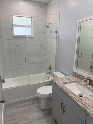 Bathroom, Glass Shower, Interior, Marble Walls, Wood Texture Flooring