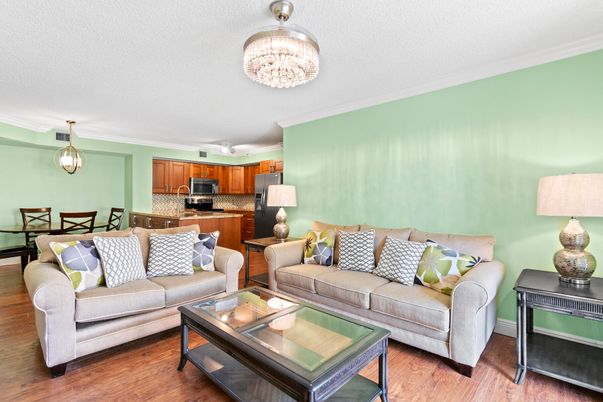 Chandelier, Dining room, Interior, Kitchen, Living room, Pendant Lights, Stainless Steel Appliances, Wood Texture Flooring