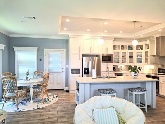 Dining room, Interior, Kitchen, Pendant Lights, Recessed Lighting, Stainless Steel Appliances, Wood Texture Flooring