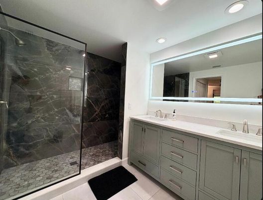 Bathroom, Dual Sink Vanities, Glass Shower, Interior, Marble Walls, Recessed Lighting
