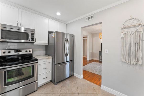 Interior, Kitchen, Recessed Lighting, Stainless Steel Appliances, Wood Texture Flooring