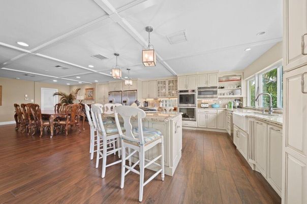 Dining room, Interior, Kitchen, Pendant Lights, Recessed Lighting, Stainless Steel Appliances, Wood Texture Flooring
