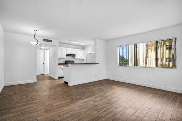 Empty room, Interior, Kitchen, Stainless Steel Appliances, Wood Texture Flooring