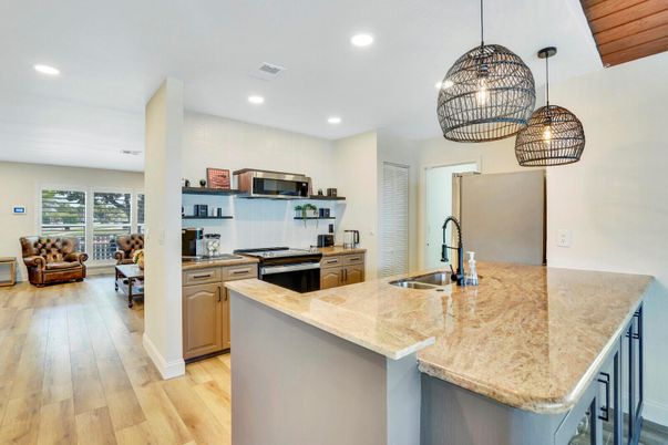 Interior, Kitchen, Pendant Lights, Recessed Lighting, Stainless Steel Appliances, Wood Texture Flooring