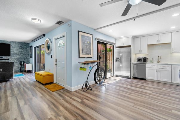 Interior, Kitchen, Recessed Lighting, Stainless Steel Appliances, Stone Walls, Wood Texture Flooring