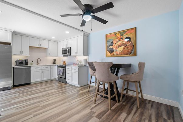 Interior, Kitchen, Recessed Lighting, Stainless Steel Appliances, Wood Texture Flooring