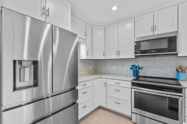 Interior, Kitchen, Recessed Lighting, Stainless Steel Appliances, Wood Texture Flooring