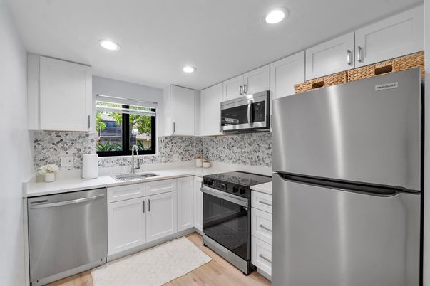 Interior, Kitchen, Recessed Lighting, Stainless Steel Appliances, Wood Texture Flooring