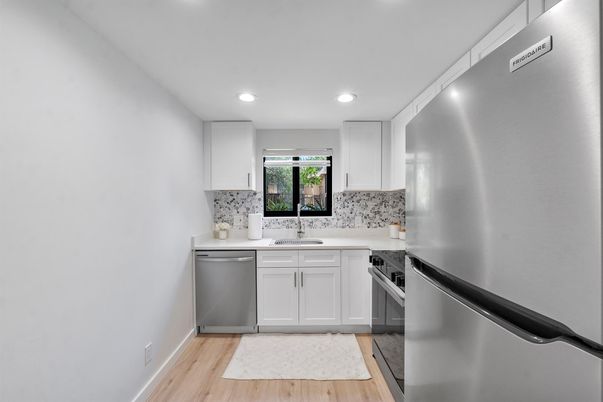 Interior, Kitchen, Recessed Lighting, Stainless Steel Appliances, Wood Texture Flooring