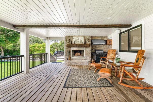 Exterior, Fireplace, Wood Texture Flooring