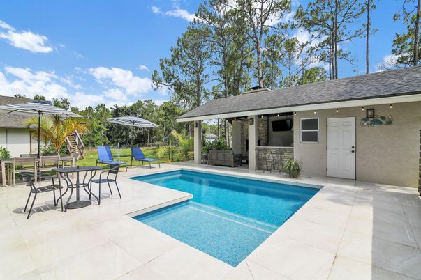 Exterior, Pool, Solar Panels