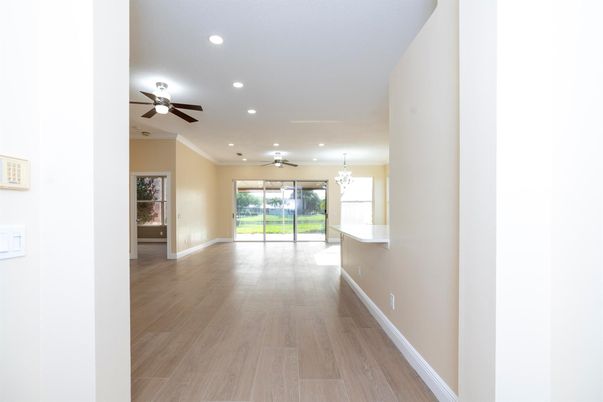 Chandelier, Empty room, Interior, Recessed Lighting, Wood Texture Flooring