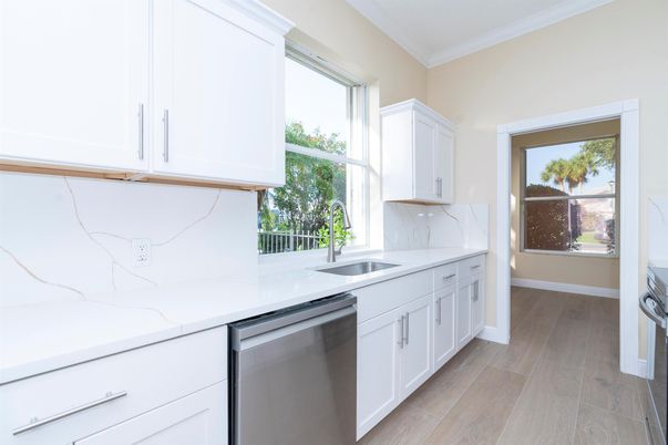 Interior, Kitchen, Marble Walls, Stainless Steel Appliances, Wood Texture Flooring